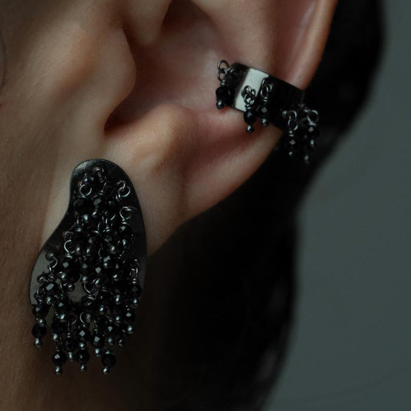 Nocturnal Charm, Striking stud earrings made from black galvanized bronze and adorned with intricate crystal beads.