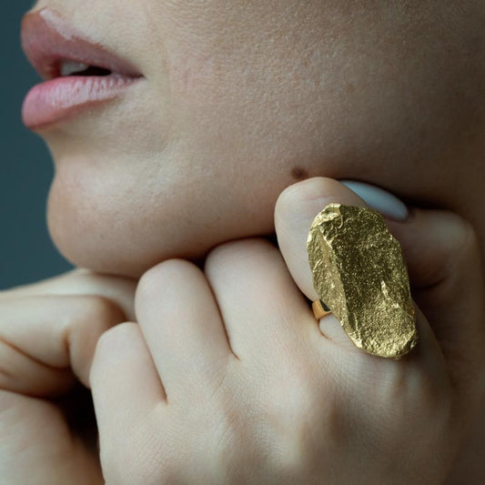 Golden Delights, A unique ring in bronze with a distinct silhouette that captures the raw essence of nature, perfect for those who dare to stand out.