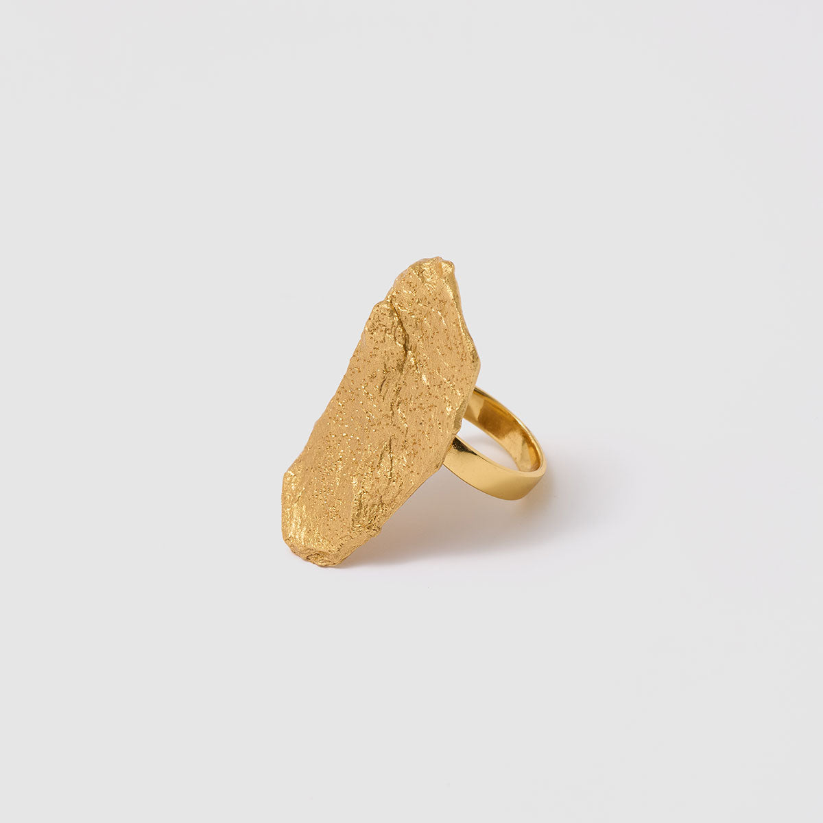 Golden Delights, A unique ring in bronze with a distinct silhouette that captures the raw essence of nature, perfect for those who dare to stand out.