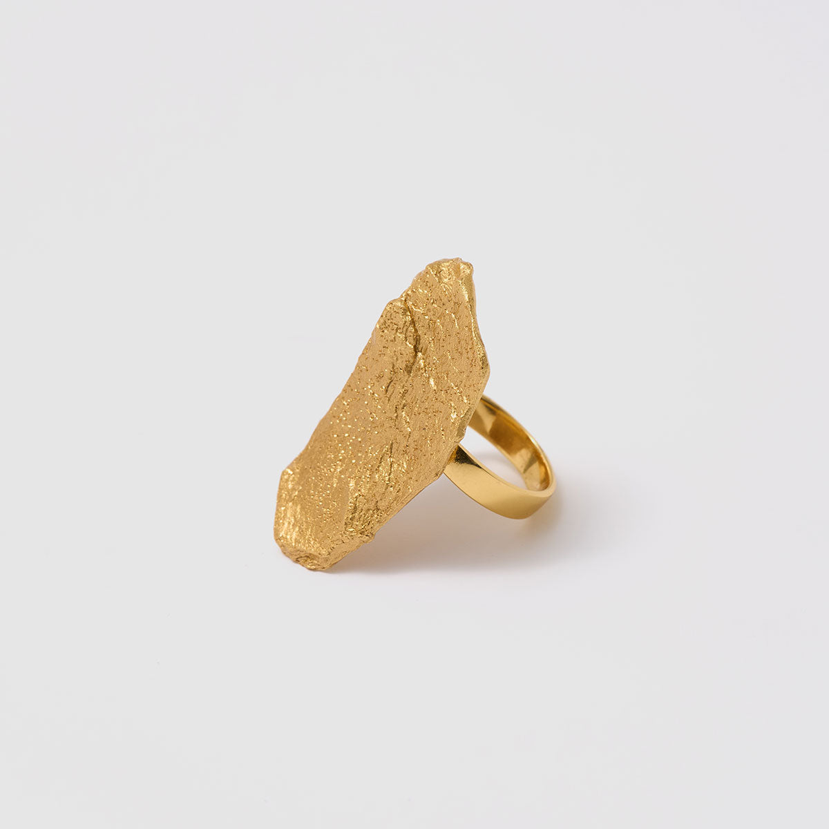 Golden Delights, A unique ring in bronze with a distinct silhouette that captures the raw essence of nature, perfect for those who dare to stand out.