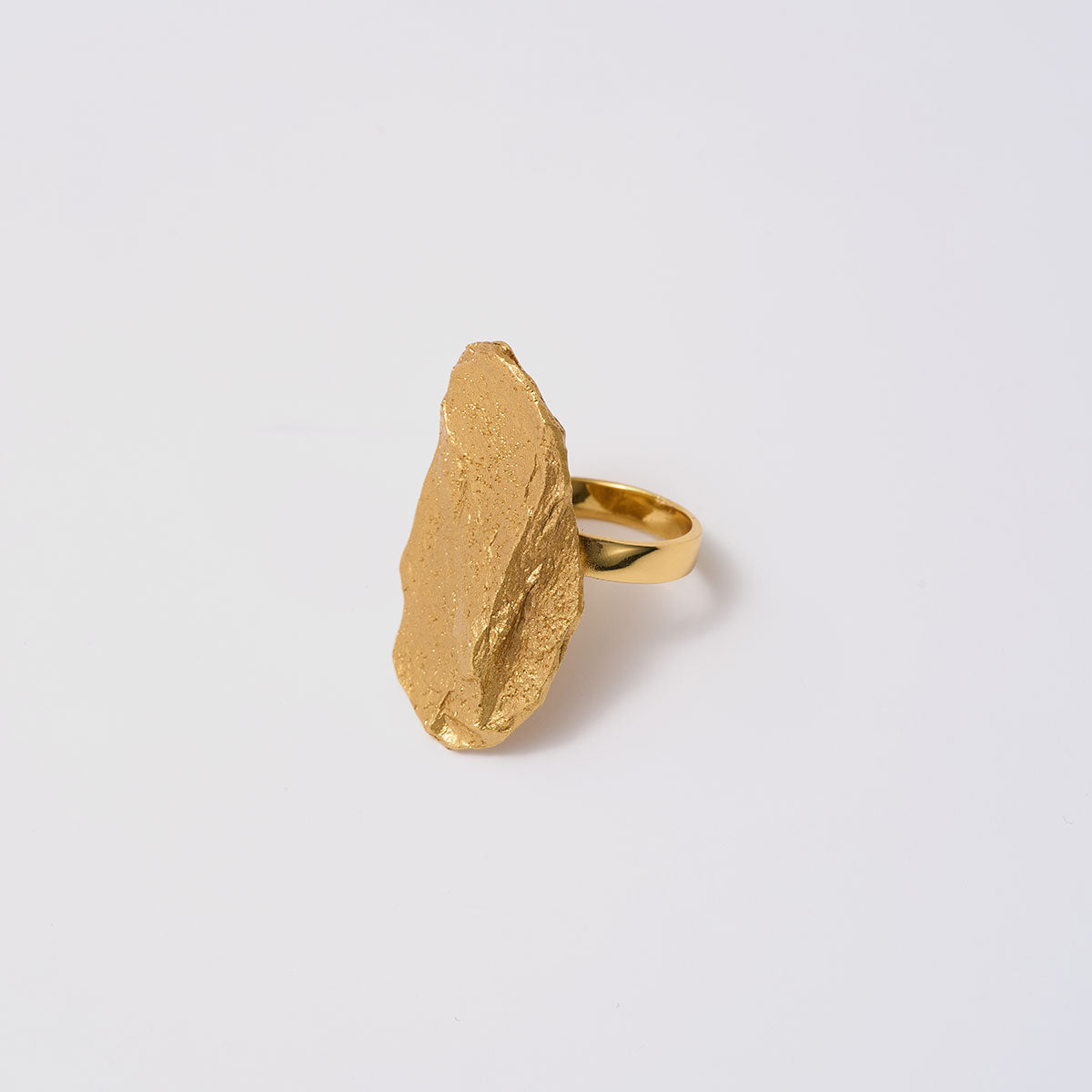 Golden Delights, A unique ring in bronze with a distinct silhouette that captures the raw essence of nature, perfect for those who dare to stand out.