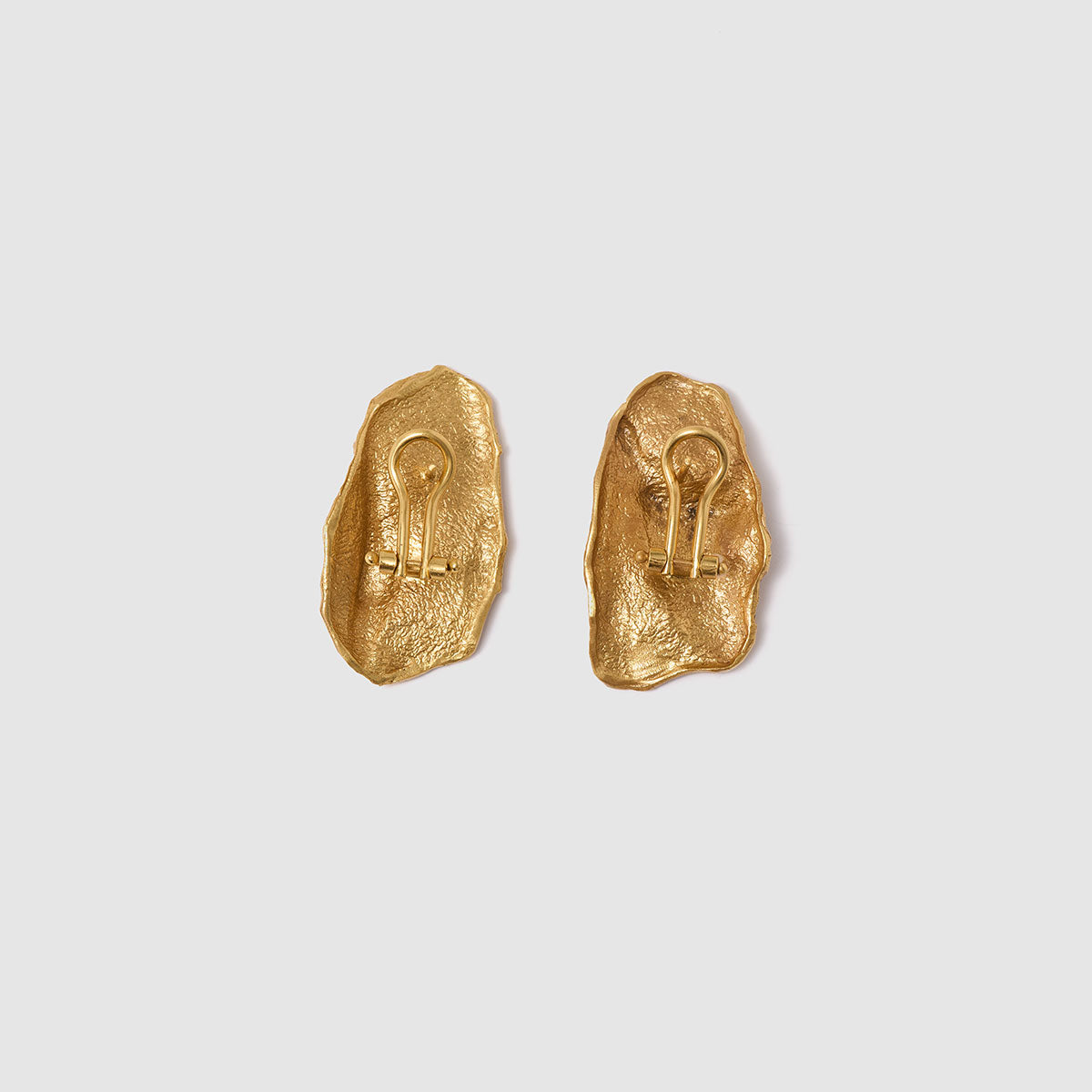 Golden Delights, Artistic stud earrings, crafted in bronze, featuring a sculptural design that celebrates the beauty of imperfection.