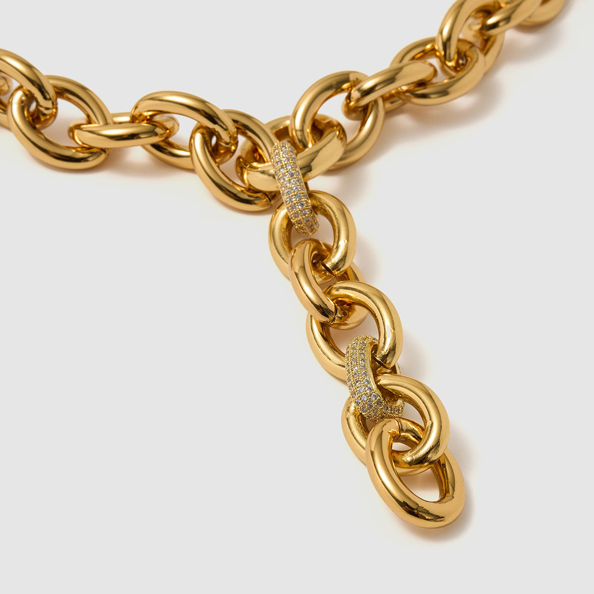 Charmed Voyage, Y-chain necklace featuring bold links and delicate zircon details.