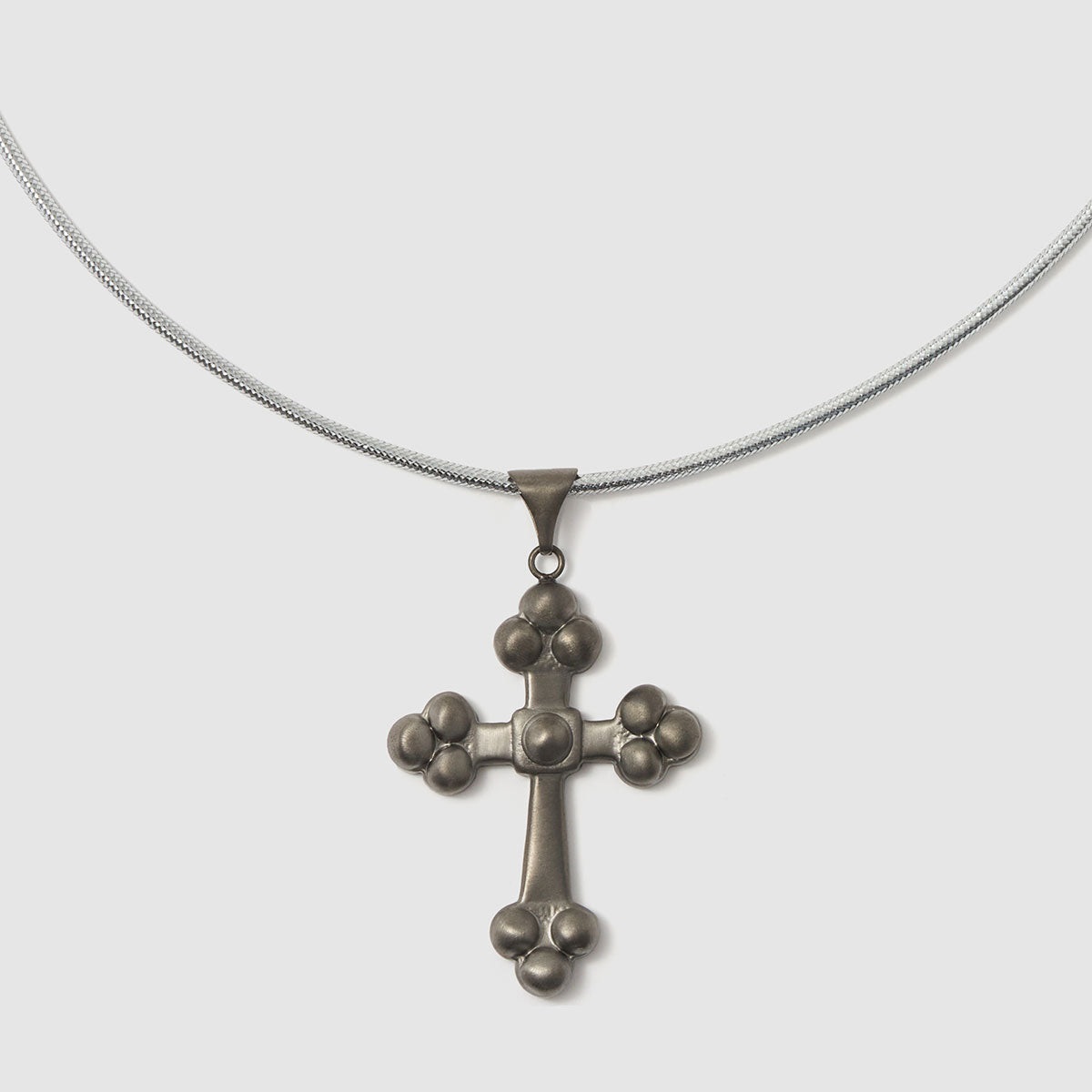 Crossroads of Time, An exquisite bronze cross pendant that beautifully embodies spirituality and style, ideal for layering with other pieces.
Available in black, gold and silver tones.