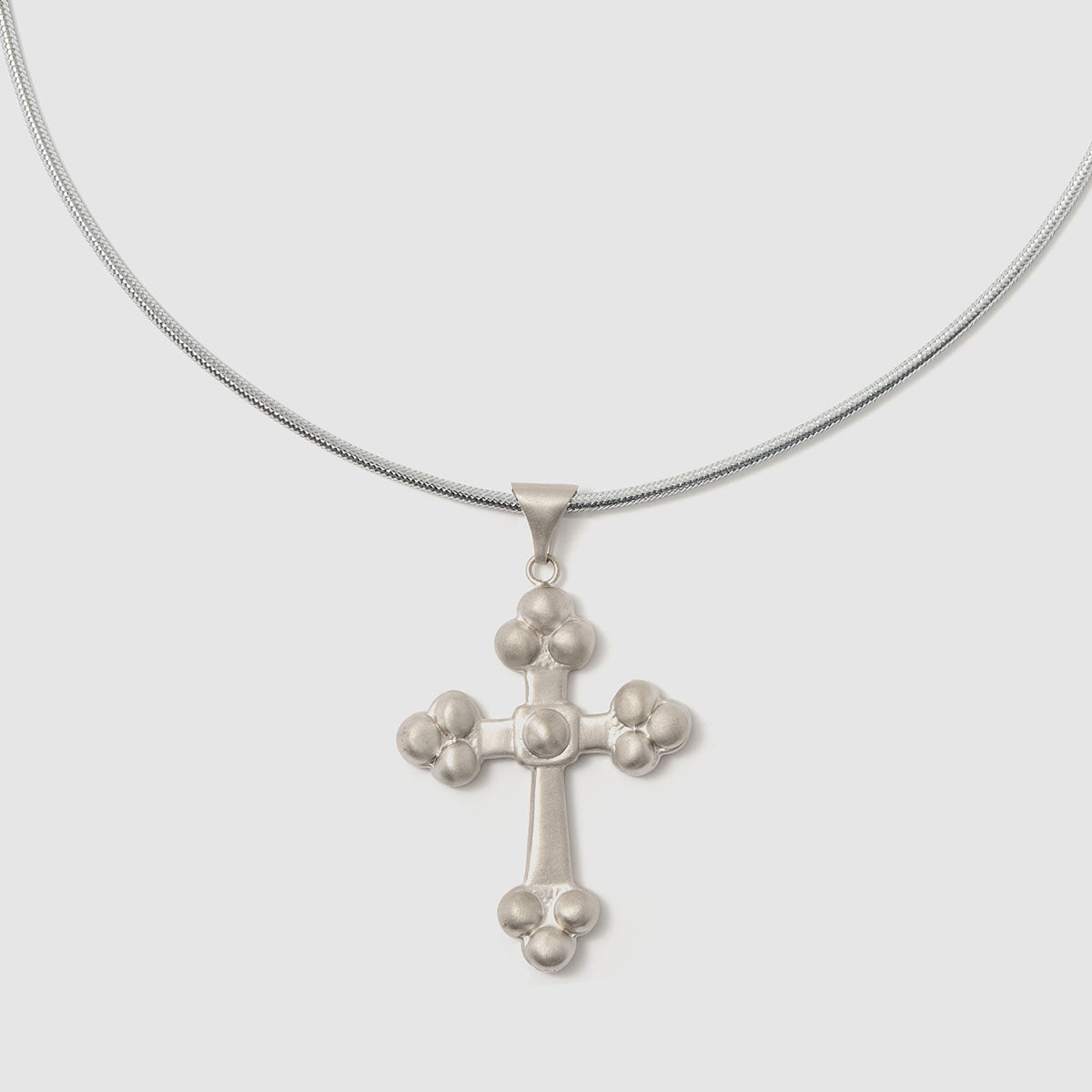 Crossroads of Time, An exquisite bronze cross pendant that beautifully embodies spirituality and style, ideal for layering with other pieces.
Available in black, gold and silver tones.