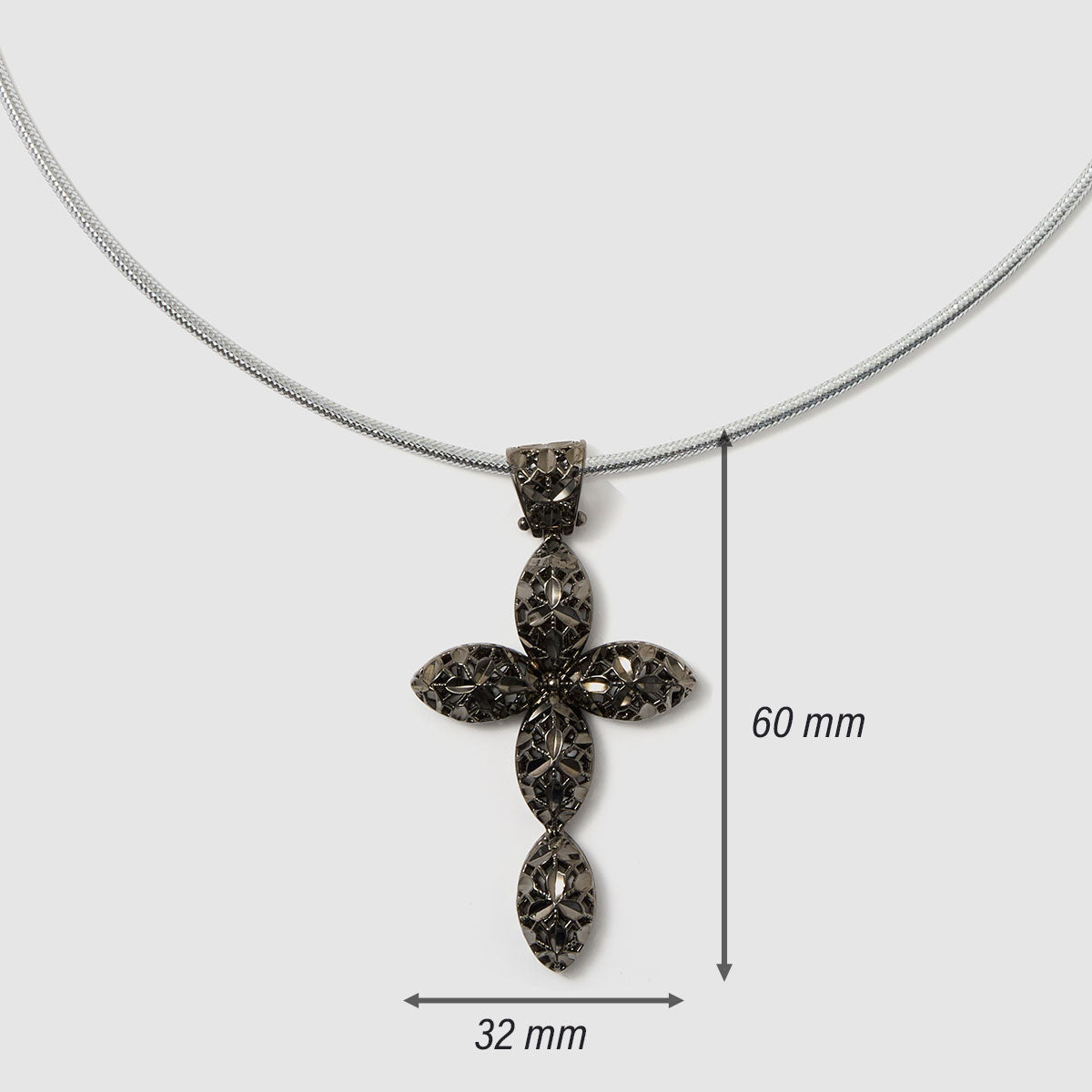 Crossroads of Time, A decorative cross pendant in black-tone bronze, featuring detailed artistry that merges modern style with spiritual significance.
Available in gold and black tones.