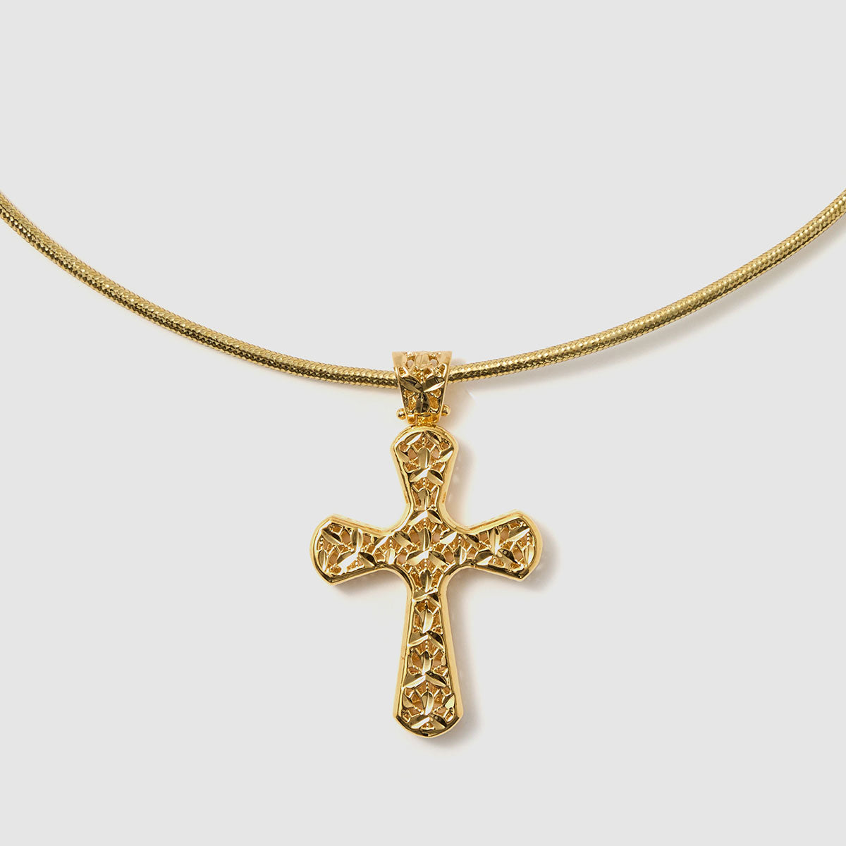 Crossroads of Time, A beautifully detailed textured cross pendant in bronze, adding depth and character to any outfit.
Available in gold and black tones.