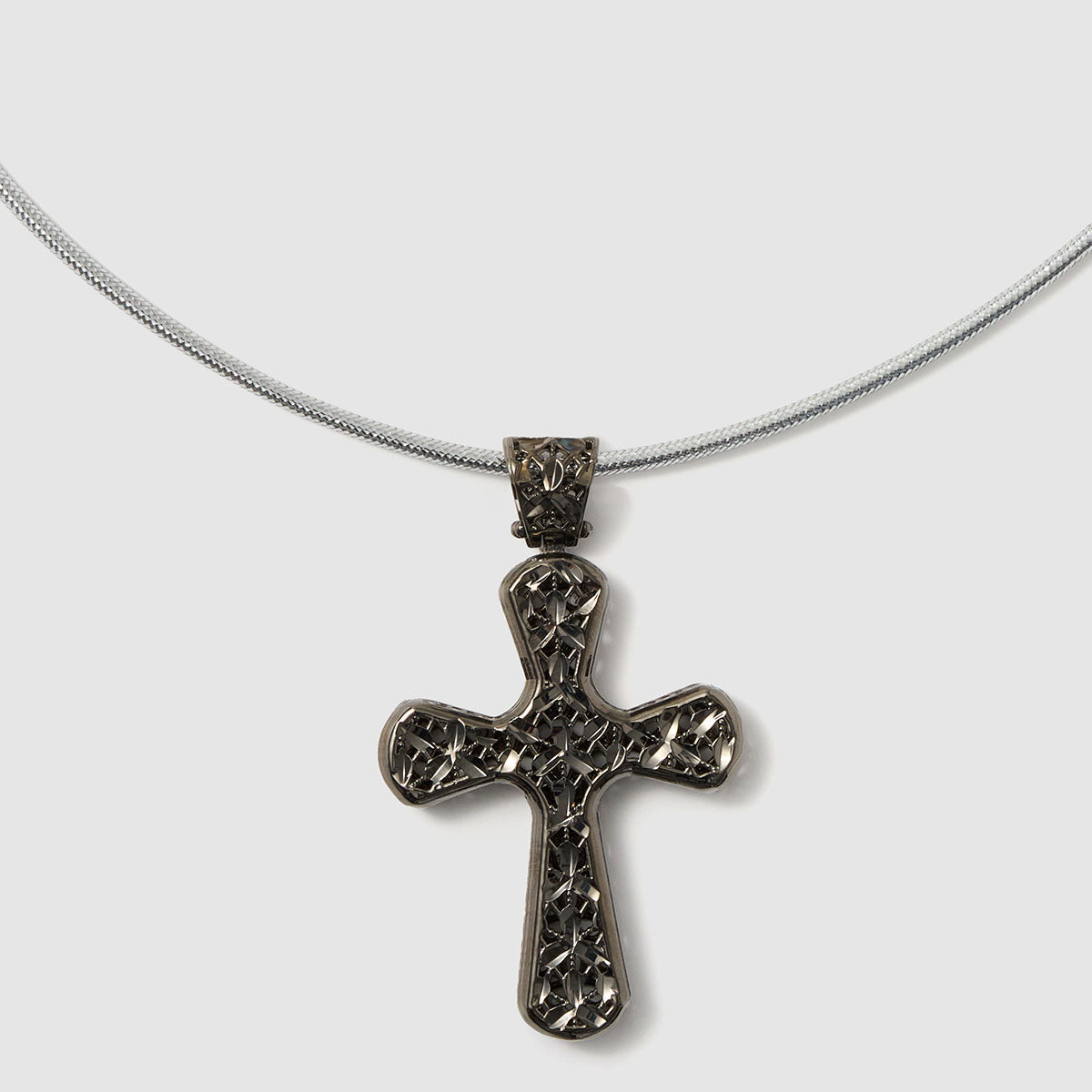 Crossroads of Time, A beautifully detailed textured cross pendant in bronze, adding depth and character to any outfit.
Available in gold and black tones.