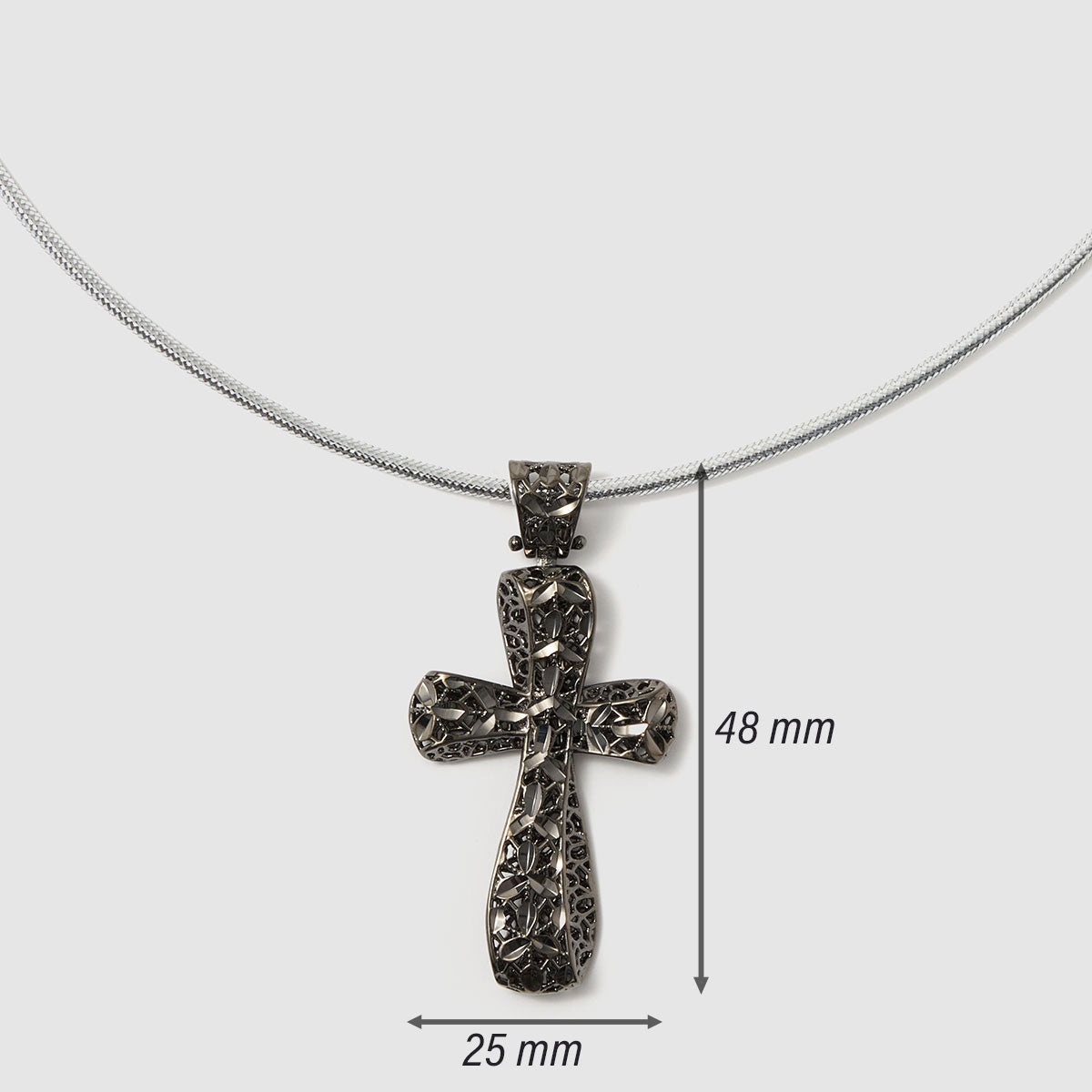 Crossroads of Time, A striking bronze cross pendant with a unique textured finish, merging tradition with a modern edge for a bold statement.
Available in gold and black tones.