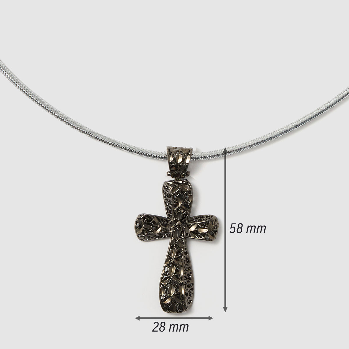 Crossroads of Time, A striking bronze cross pendant with a unique textured finish, merging tradition with a modern edge for a bold statement.
Available in gold and black tones.