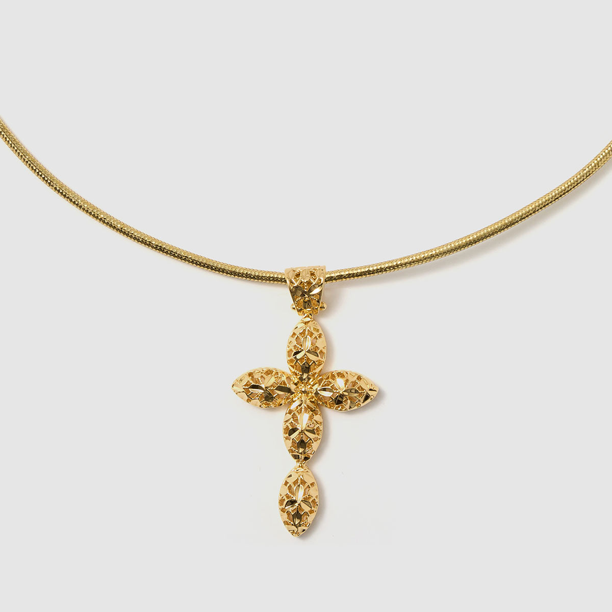 Crossroads of Time, A decorative cross pendant in black-tone bronze, featuring detailed artistry that merges modern style with spiritual significance.
Available in gold and black tones.