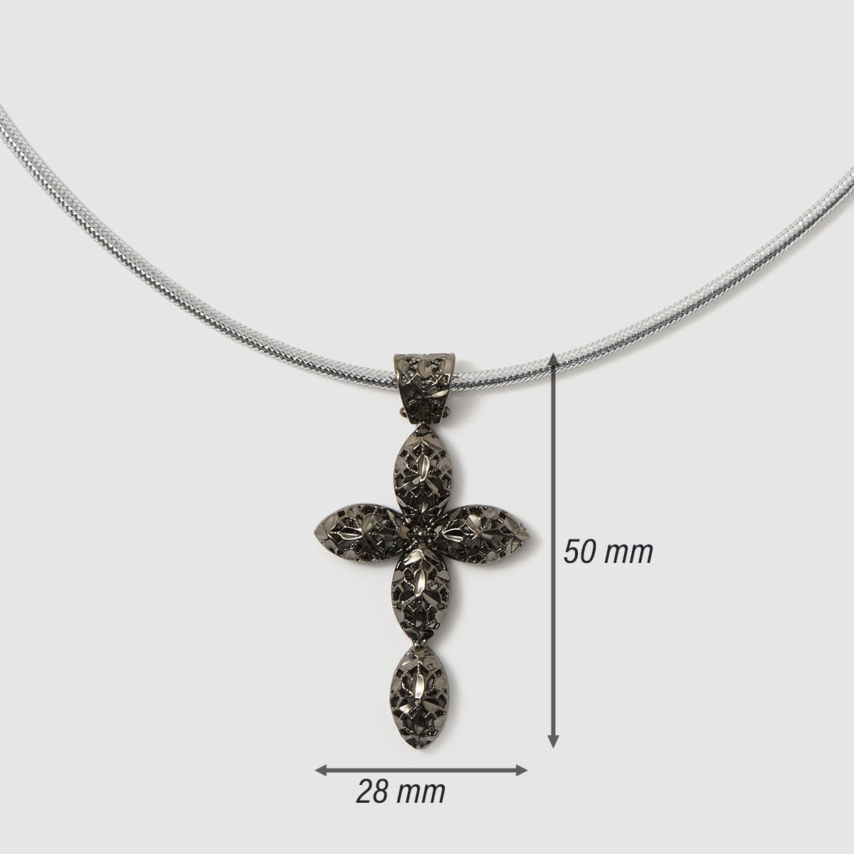 Crossroads of Time, A decorative cross pendant in black-tone bronze, featuring detailed artistry that merges modern style with spiritual significance.
Available in gold and black tones.