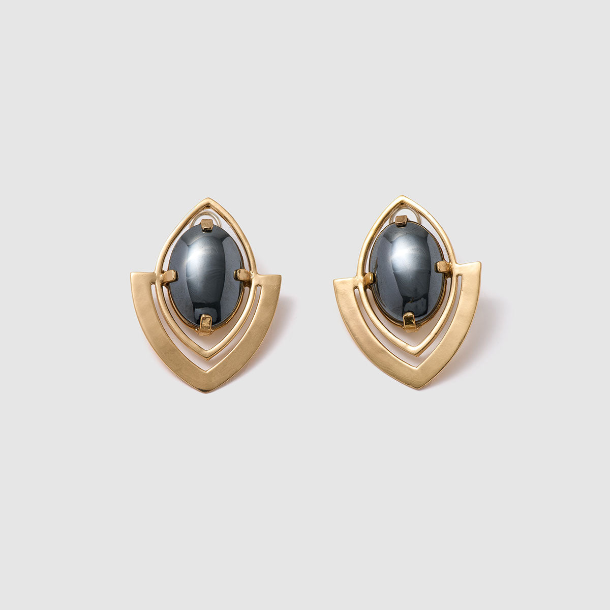 Mystic Vision, Elegant stud earrings featuring bronze frames and striking hematite cabochons.