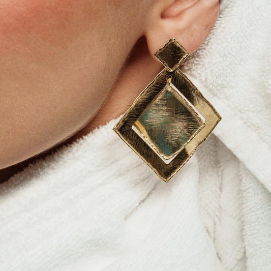 Golden Petals, Bold geometric square earrings crafted from bronze, merging contemporary design with the elegance of nature’s shapes.