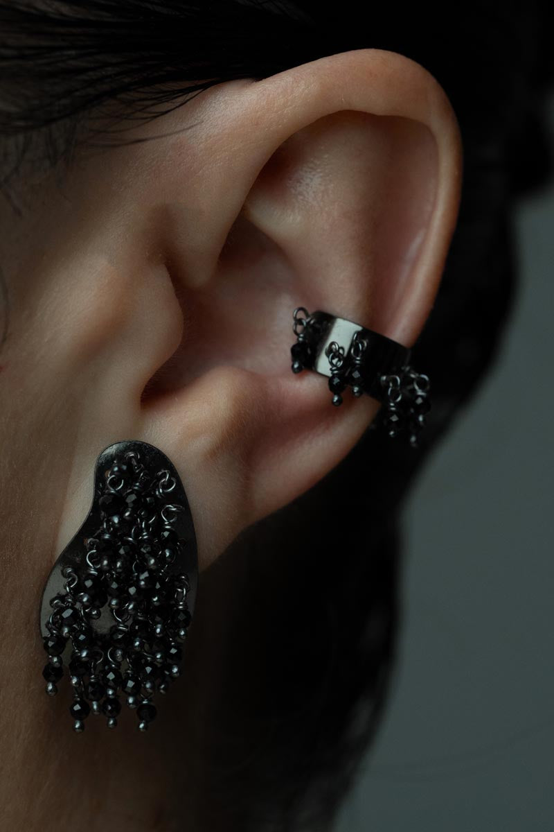 Nocturnal Charm, Striking stud earrings made from black galvanized bronze and adorned with intricate crystal beads.