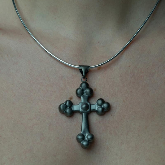 Crossroads of Time, An exquisite bronze cross pendant that beautifully embodies spirituality and style, ideal for layering with other pieces.
Available in black, gold and silver tones.