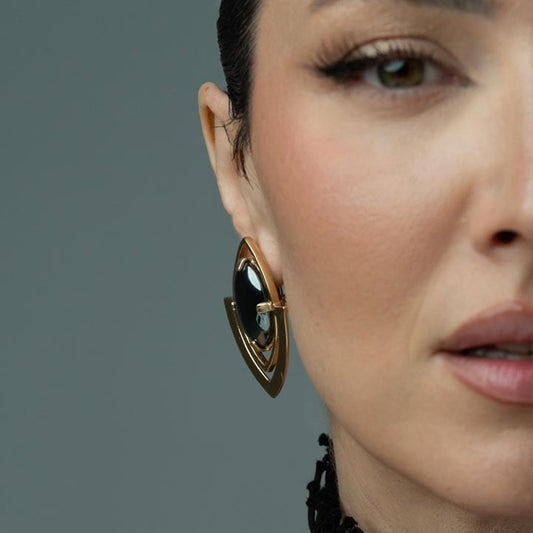Mystic Vision, Elegant stud earrings featuring bronze frames and striking hematite cabochons.