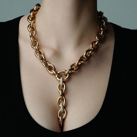 Charmed Voyage, Y-chain necklace featuring bold links and delicate zircon details.