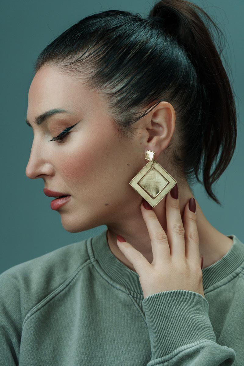 Golden Petals, Bold geometric square earrings crafted from bronze, merging contemporary design with the elegance of nature’s shapes.